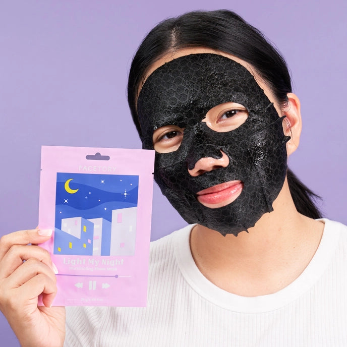 photo of woman wearing sheet mask
