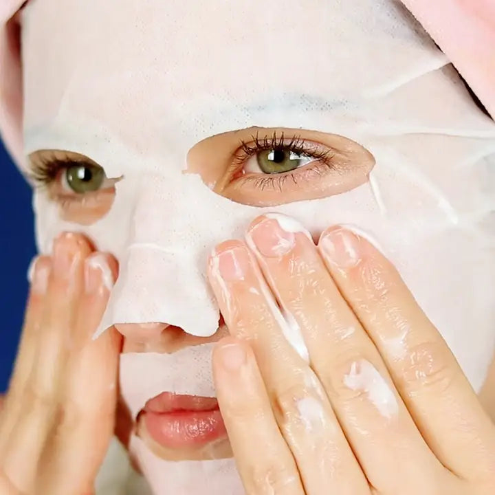 photo of woman wearing sheet mask