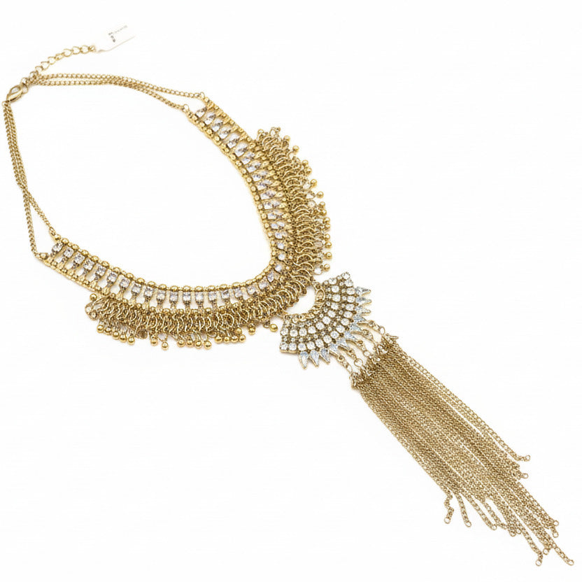Gold and rhinestone necklace with chains on a white background.