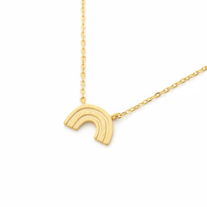 Gold rainbow necklace on a white background