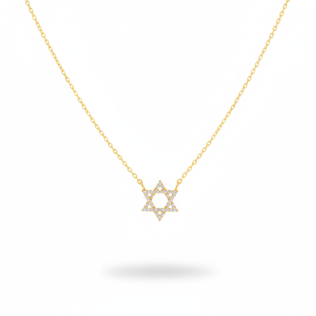 Gold necklace with a Star of David pendant on a white background