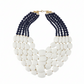 Necklace with white beads and navy blue beaded strands on a white background