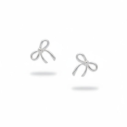 Pair of rhodium-plated bow-shaped earrings on a white background