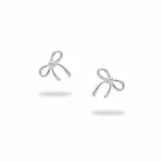 Pair of rhodium-plated bow-shaped earrings on a white background