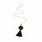 Black tassel necklace on a white  background