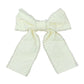 Large bow with pearl details on  white background