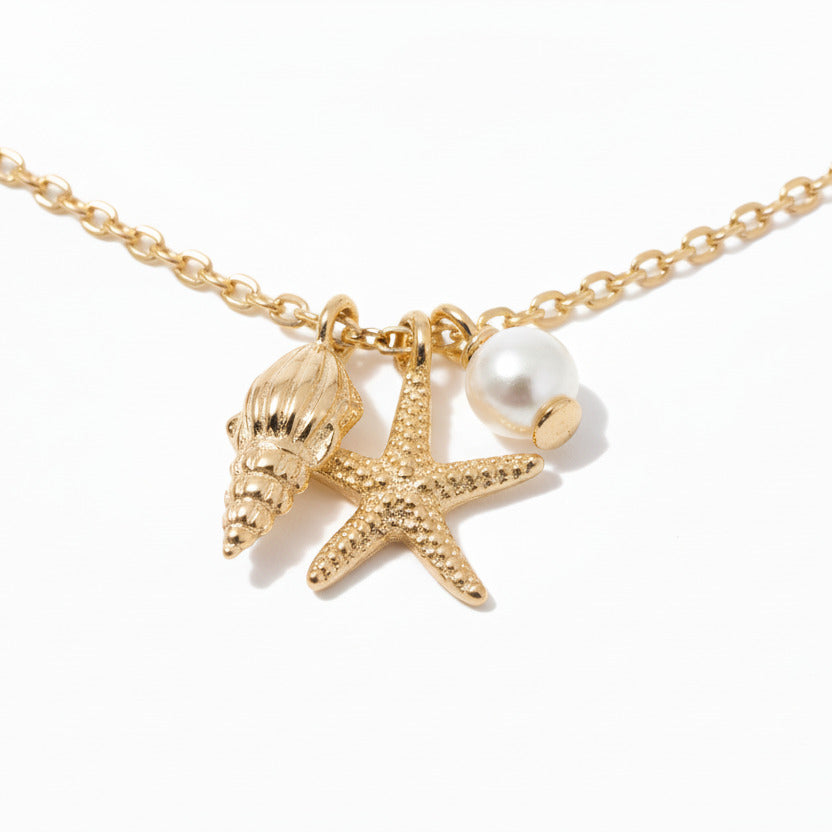 Necklace with starfish charm on a white background