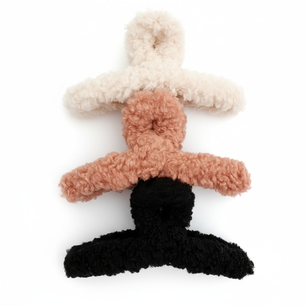 Plush hair clips in white, tan and black