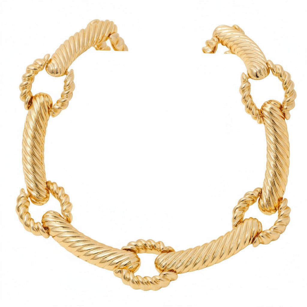 Gold chain necklace on a white background