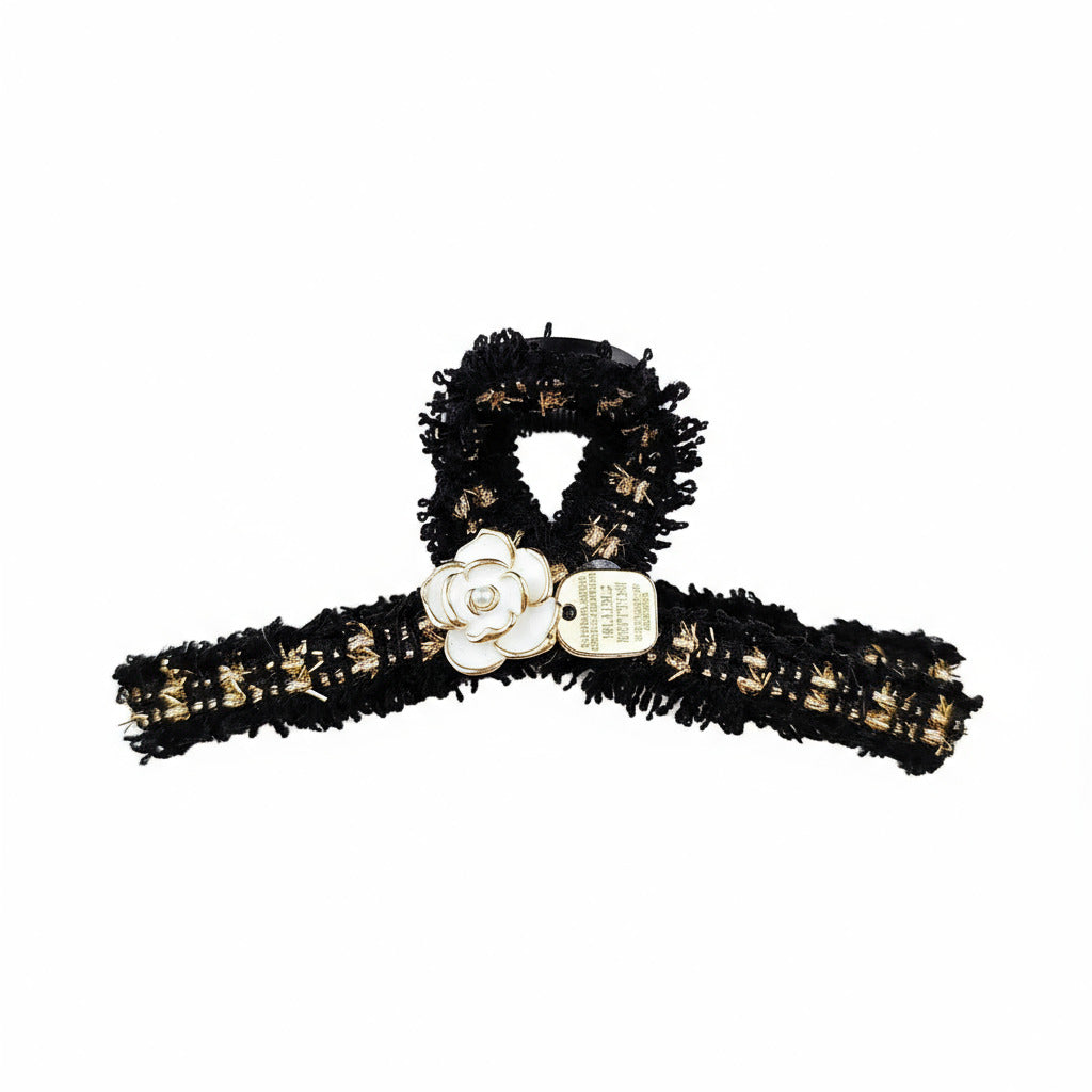 Tweed  and flower claw clip on white background
