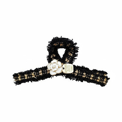 Tweed  and flower claw clip on white background