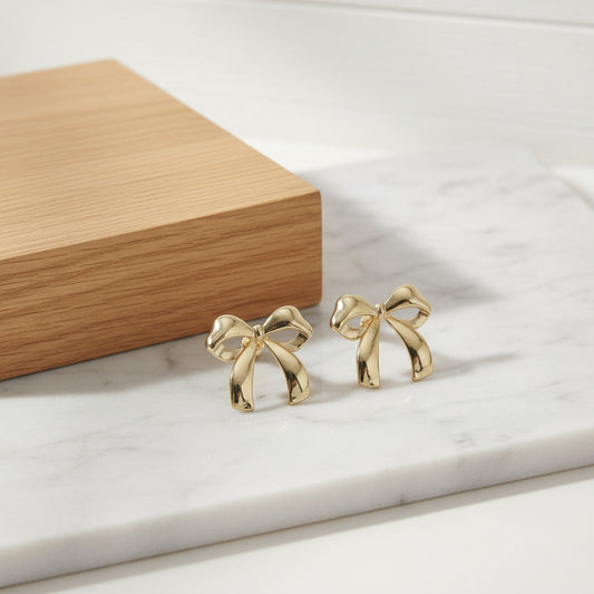 Gold bow-shaped earrings
