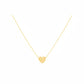 Gold heart necklace on a white background