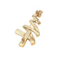 Gold christmas tree pin back on a white background