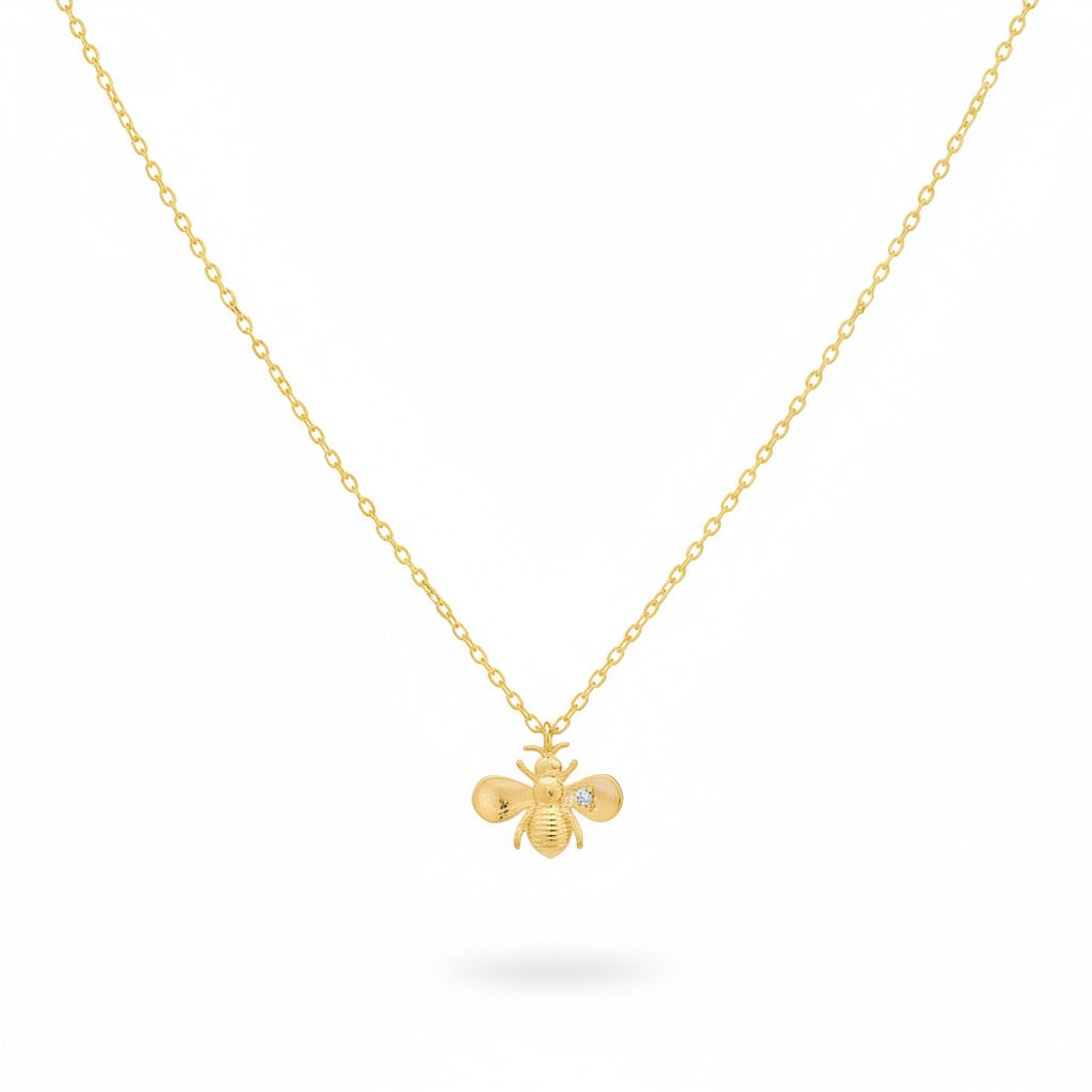 Gold necklace with bee pendant in gold