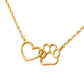 Gold necklace with a heart and paw print design on a brown background