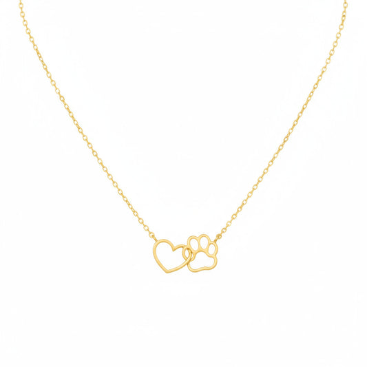 Gold necklace with paw and heart design on a white background.