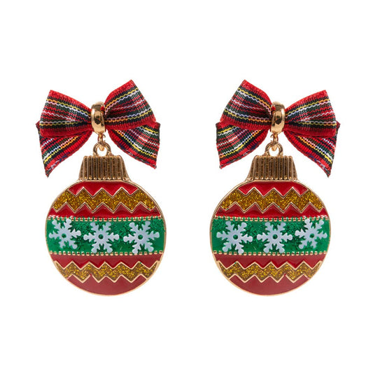 Pair of festive earrings with colorful bows and Christmas-themed designs on a white background