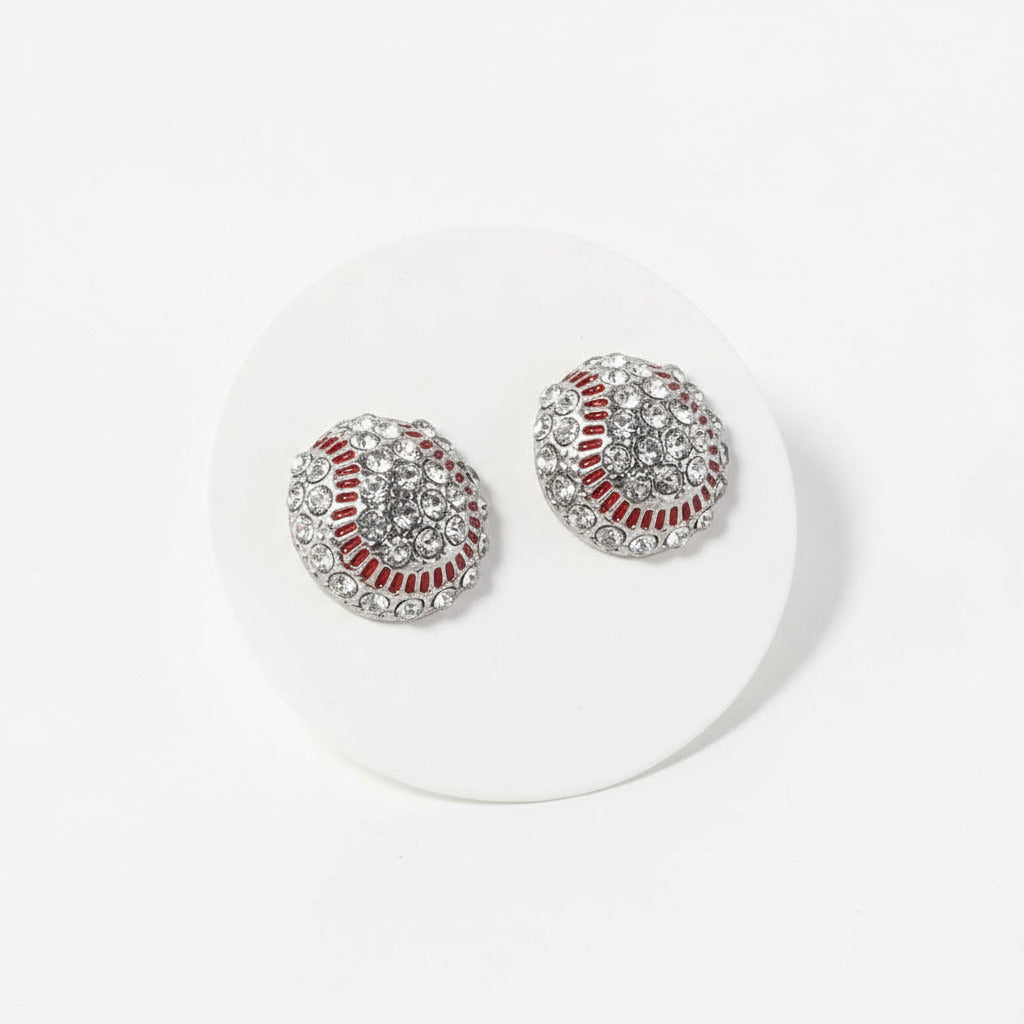 Crystal baseball earrings on a white card.