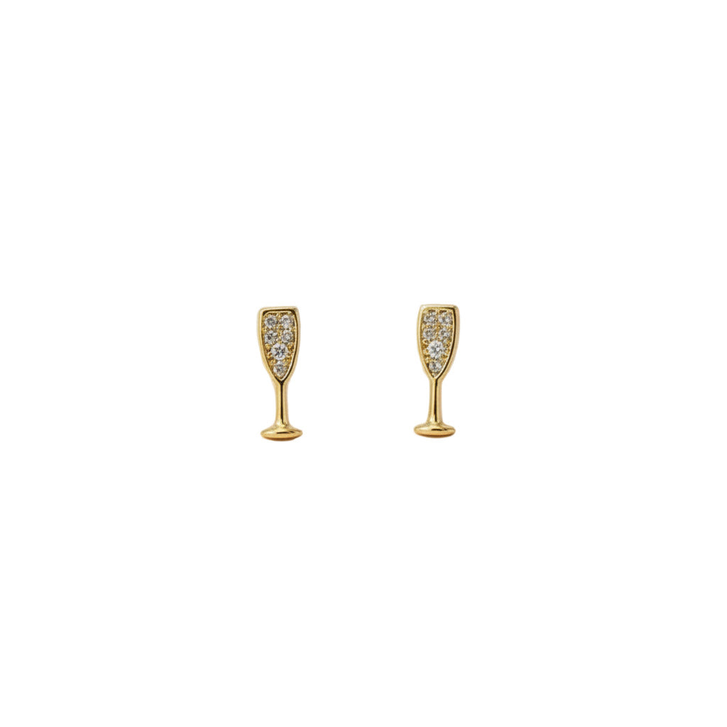 Gold-dipped rhinestone champagne glass earrings on a white background