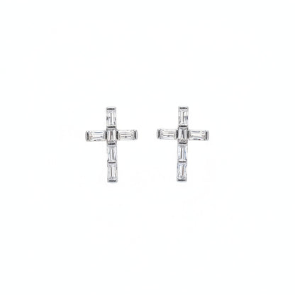Pair of rhodium-plated cross earrings on a white background