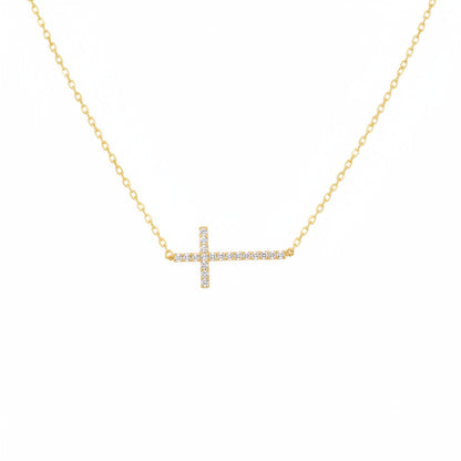 Gold necklace with a rhinestone cross pendant 