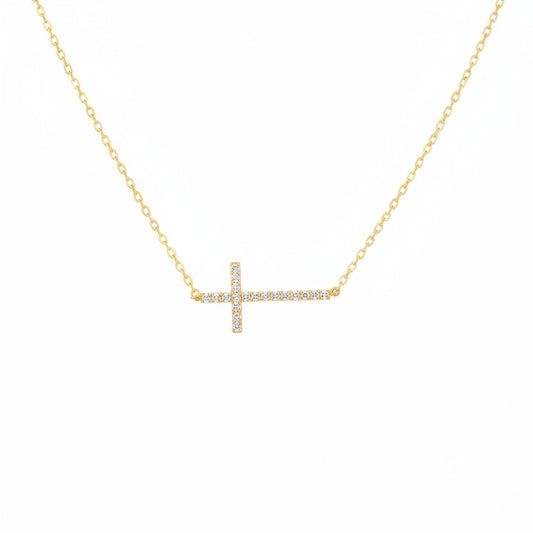 Gold necklace with a rhinestone cross pendant