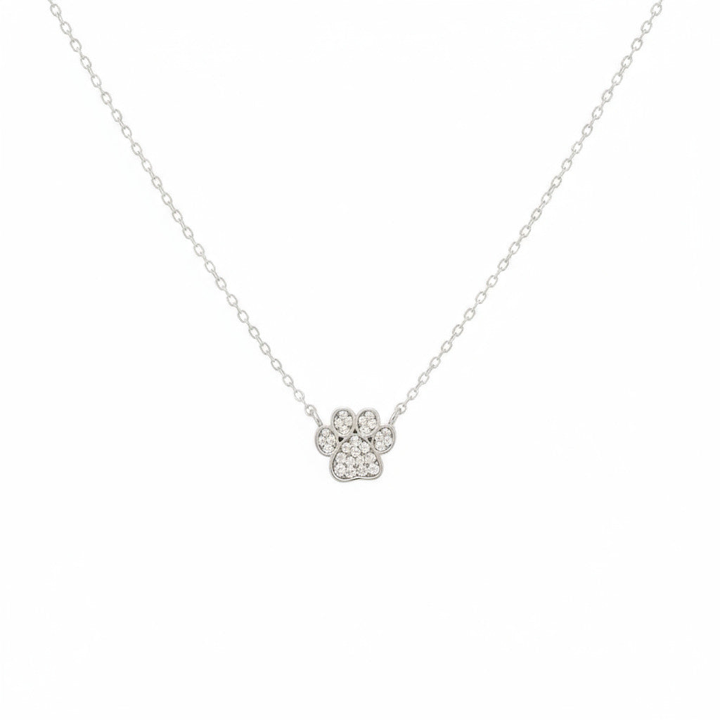 Silver necklace with a paw print-shaped pendant on a white background.