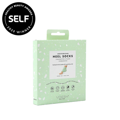 Box of heel socks with 'SELF' award badge on a white background