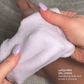White gel pad held by hands with lavender nail polish, labeled 'Latex-Free Gel Lining'.