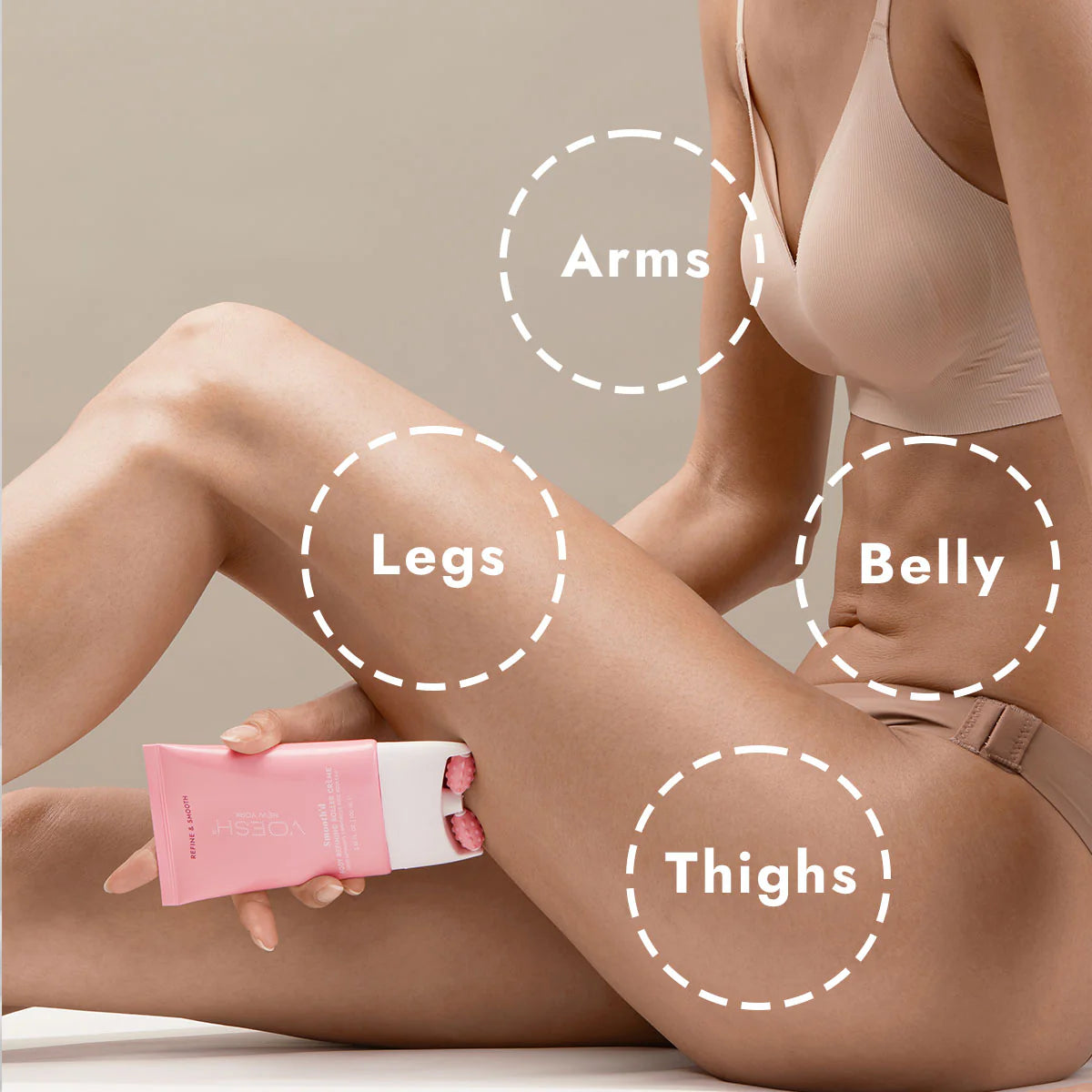 Person using a pink and white device on various body parts with labeled areas.